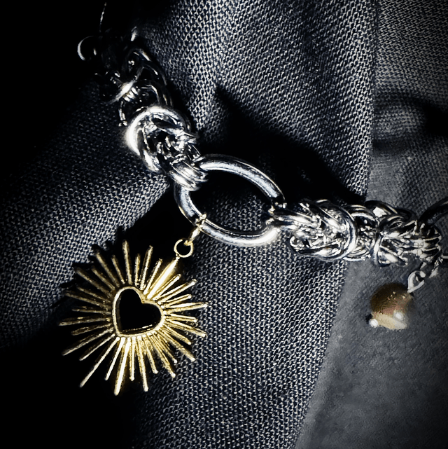 Collier EX-VOTO pierres de soleil noire 