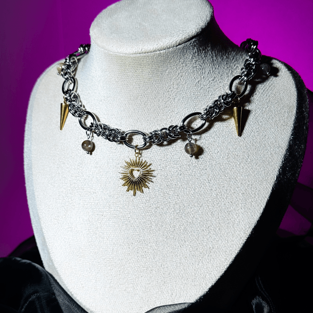 Collier EX-VOTO pierres de soleil noire 
